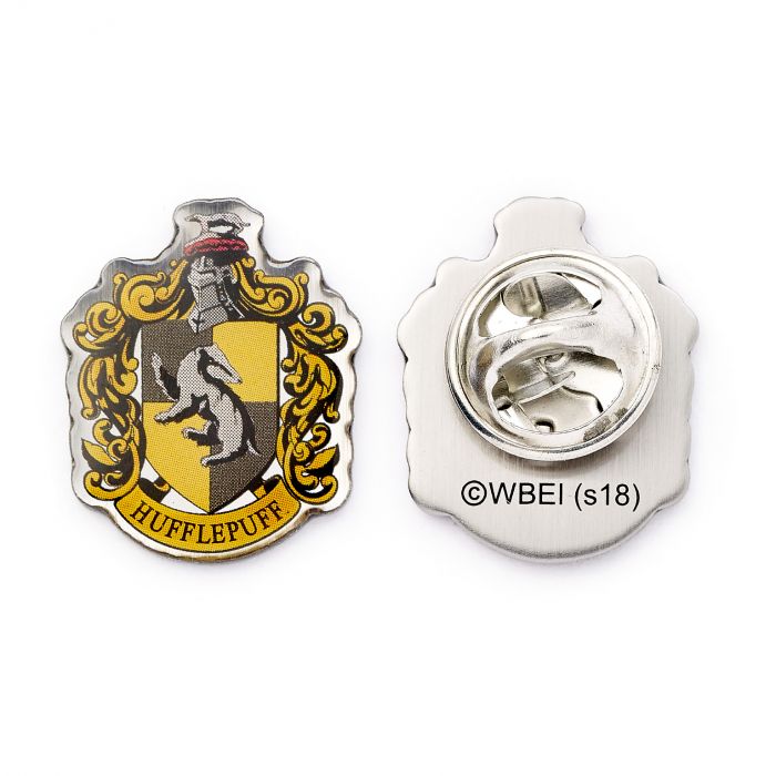 Hufflepuff House Crest Pin Badge The Crest of the famous Hogwarts house, founded by Helga Hufflepuff This Harry Potter Pin Badge has been created using the official style guide from Warner Bros. Enamel Pin Details: Around .75" tall and .5" wide (20mm x 16mm) Beautiful colors protected by a high-gloss finish Enamel pin arrives on a printed Harry Potter card backer Quality metal badge pin with butterfly clutch backing