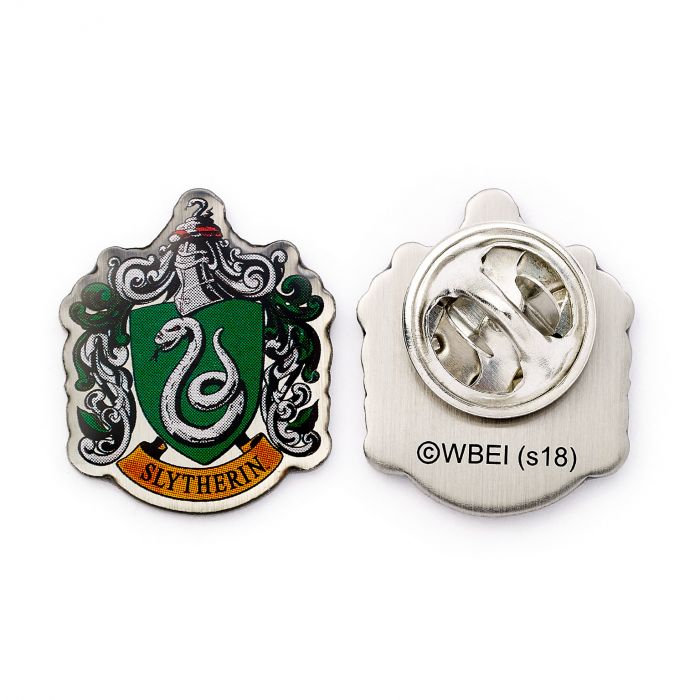Slytherin House Shield Crest Pin Badge The Crest of the famous Hogwarts House, founded by Salazar Slytherin This Harry Potter Pin Badge has been created using the official style guide from Warner Bros. Enamel Pin Details: Around .75" tall and .5" wide (20mm x 16mm) Beautiful colors protected by a high-gloss finish Enamel pin arrives on a printed Harry Potter card backer Quality metal badge pin with butterfly clutch backing